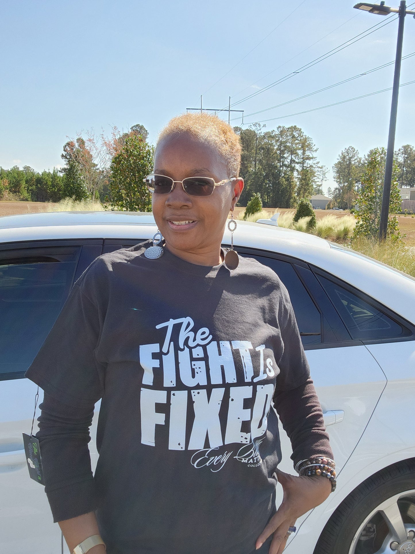The Fight Is Fixed® Signature Tee (White Lettering)
